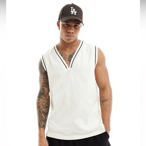 ASOS DESIGN relaxed tank top with v-neck in beige size XS